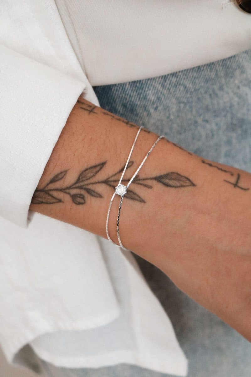 Pulseira dupla diamantada com ponto de luz