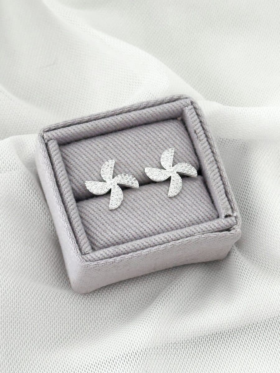 Brinco flor ventos