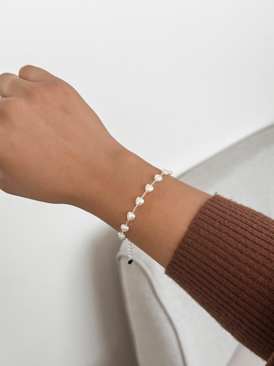 Pulseira pérolas coração deitado