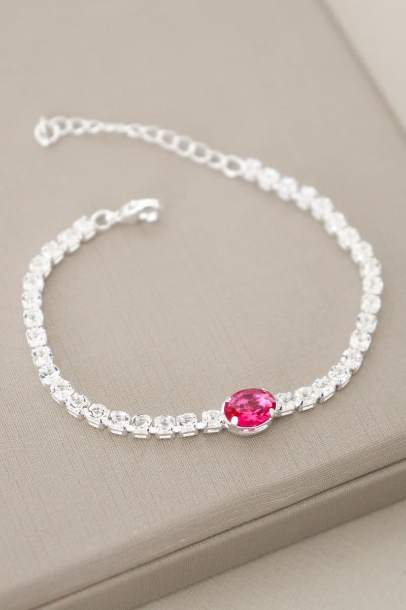 Pulseira riviera com pedra oval rosa