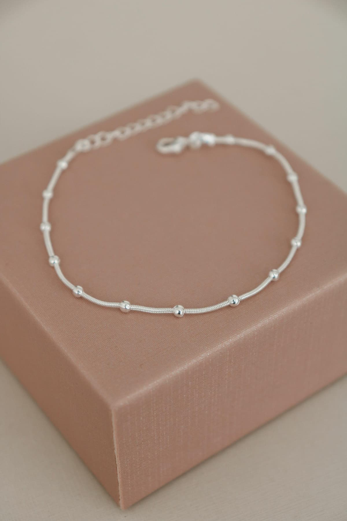Pulseira rabo de rato com bolinhas