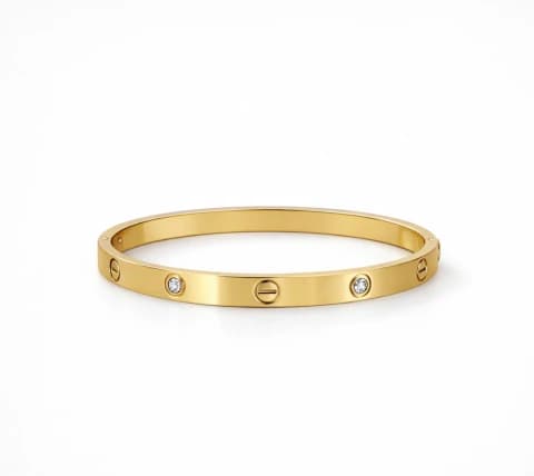 Bracelete dourado com parafusos e zircônias
