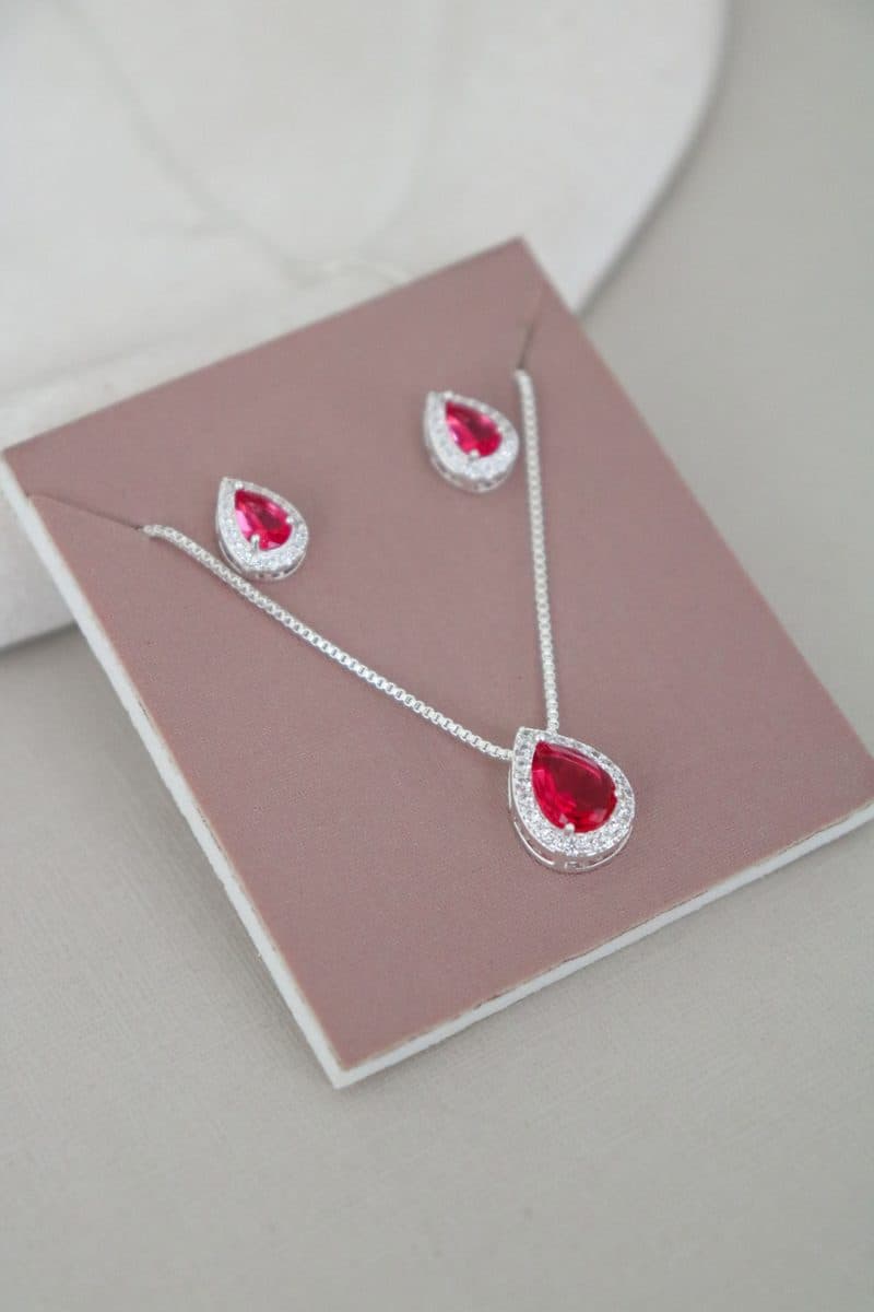 Conjunto gota cravejado rosa fucsia